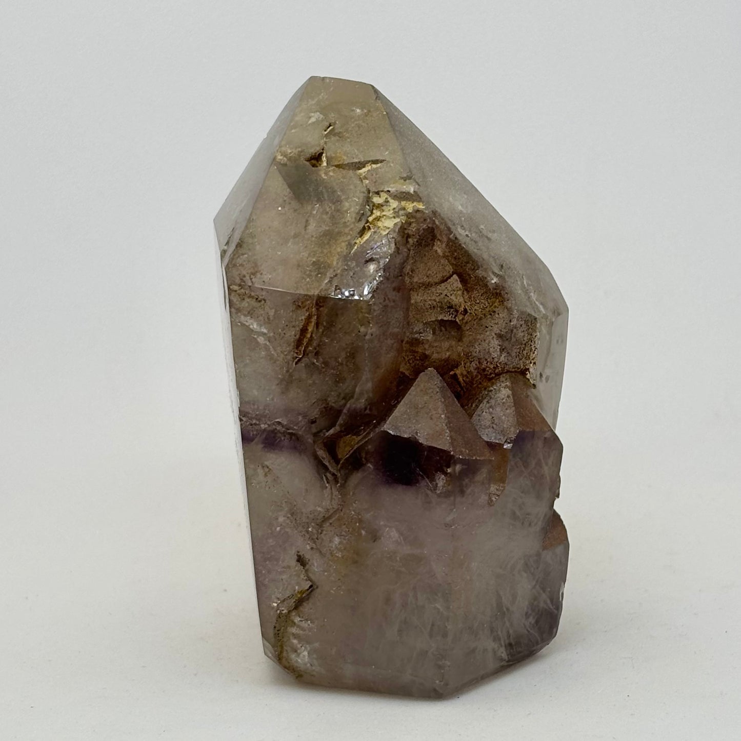 Besondere Bergkristallspitze mit. Amethyst Phantom poliert - 9 cm Besondere Bergkristallspitze mit. Amethyst Phantom poliert - 9 cm