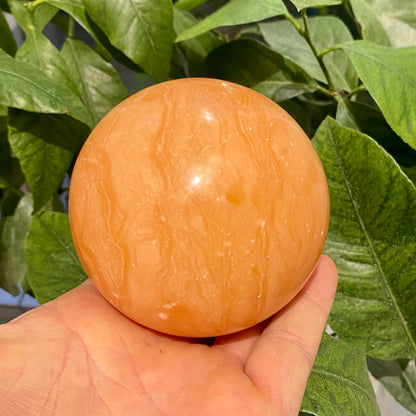 Orange kalcitboll - 9 cm