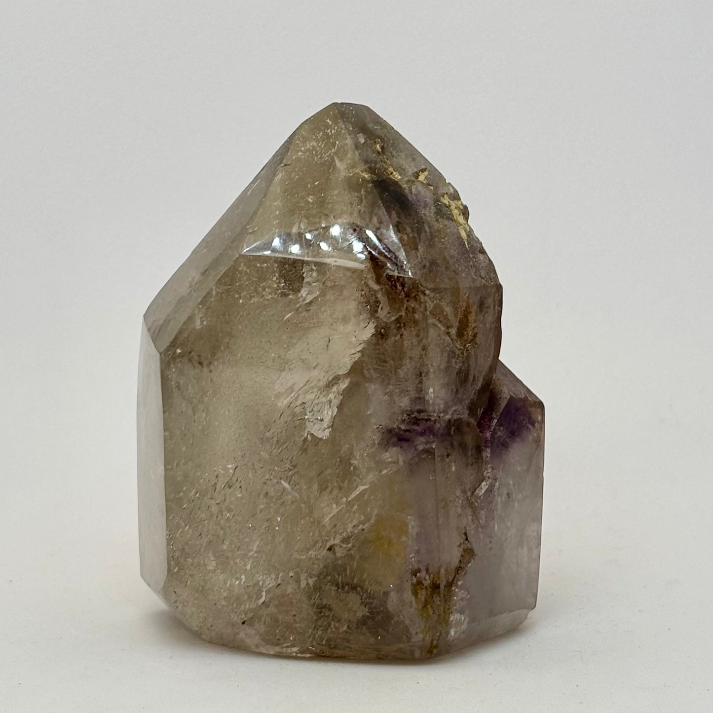 Besondere Bergkristallspitze mit. Amethyst Phantom poliert - 9 cm Besondere Bergkristallspitze mit. Amethyst Phantom poliert - 9 cm