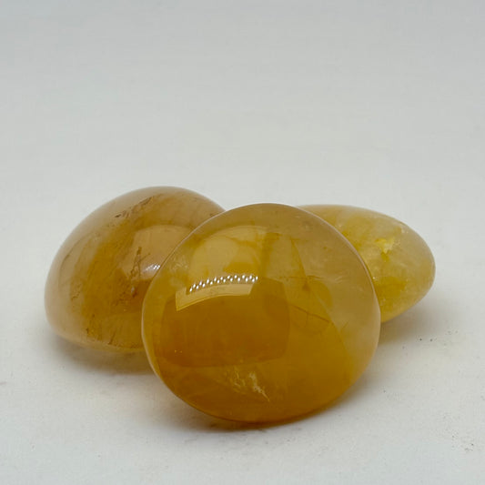 Billede af Golden Healer - palmstone 4 cm